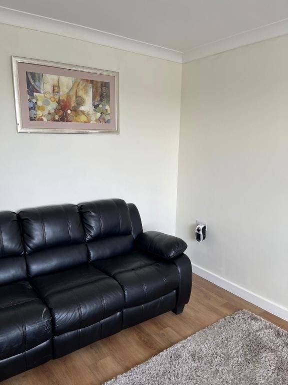 Bluehouse Drive lounge with leather sofa