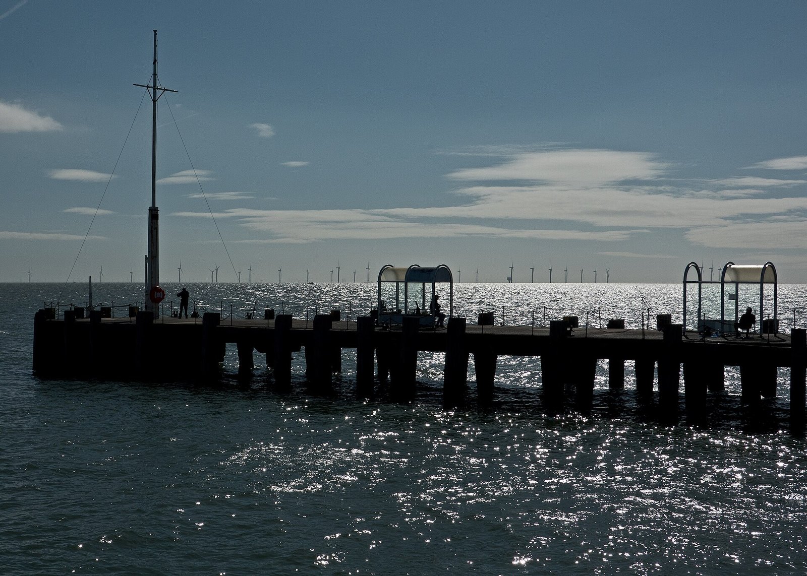 Sunlight on the sea beyond the end of Clacton Pier